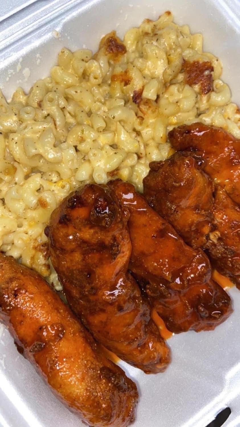 Saucy wings with creamy baked mac and cheese